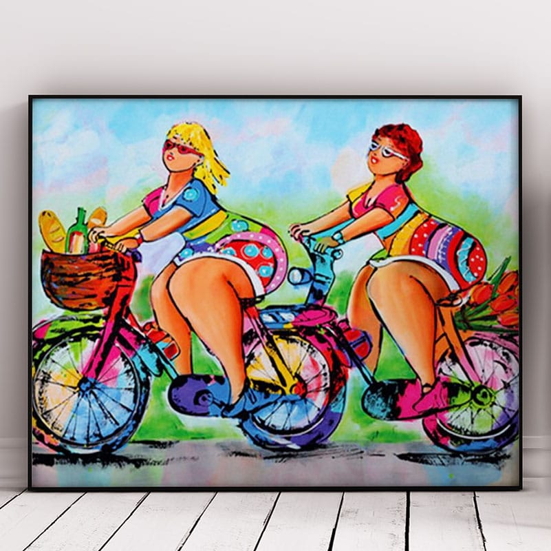 Beautiful Women Riding a Cycle