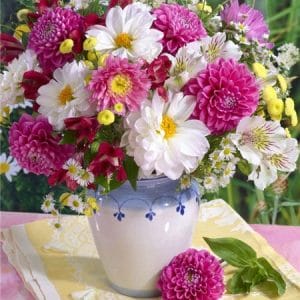 Multi-Color Flowers in a White Vase